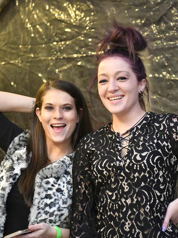 Addiction Recovery and Non Profit Divas Who Win Home Divas Services Offer to Women Woman with piercings smiling with another tattooed girl looking happy